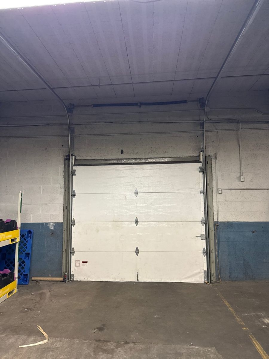 Commercial sectional door, interior bay