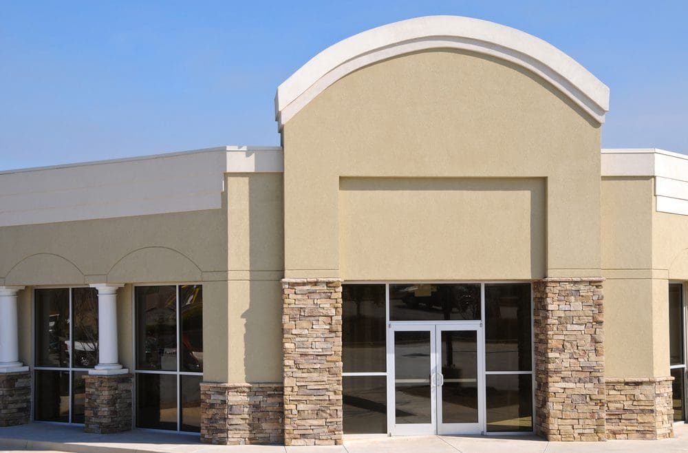 Commercial overhead sectional door on an industrial building
